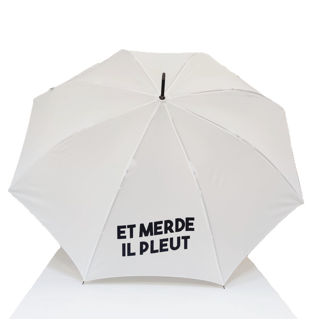 Parapluie avec inscription “Et merde il pleut”